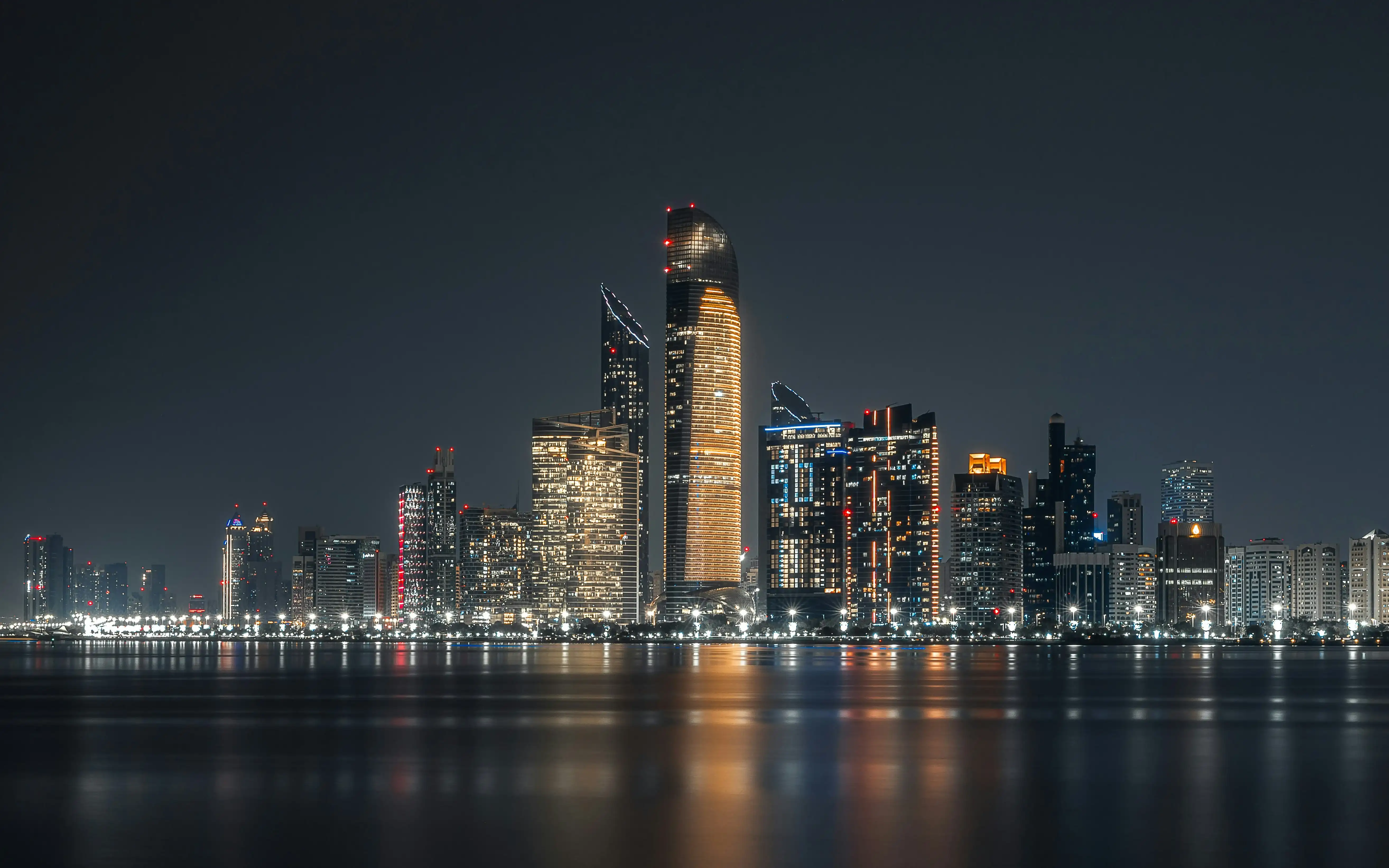 Abu Dhabi corniche and skyline at dusk